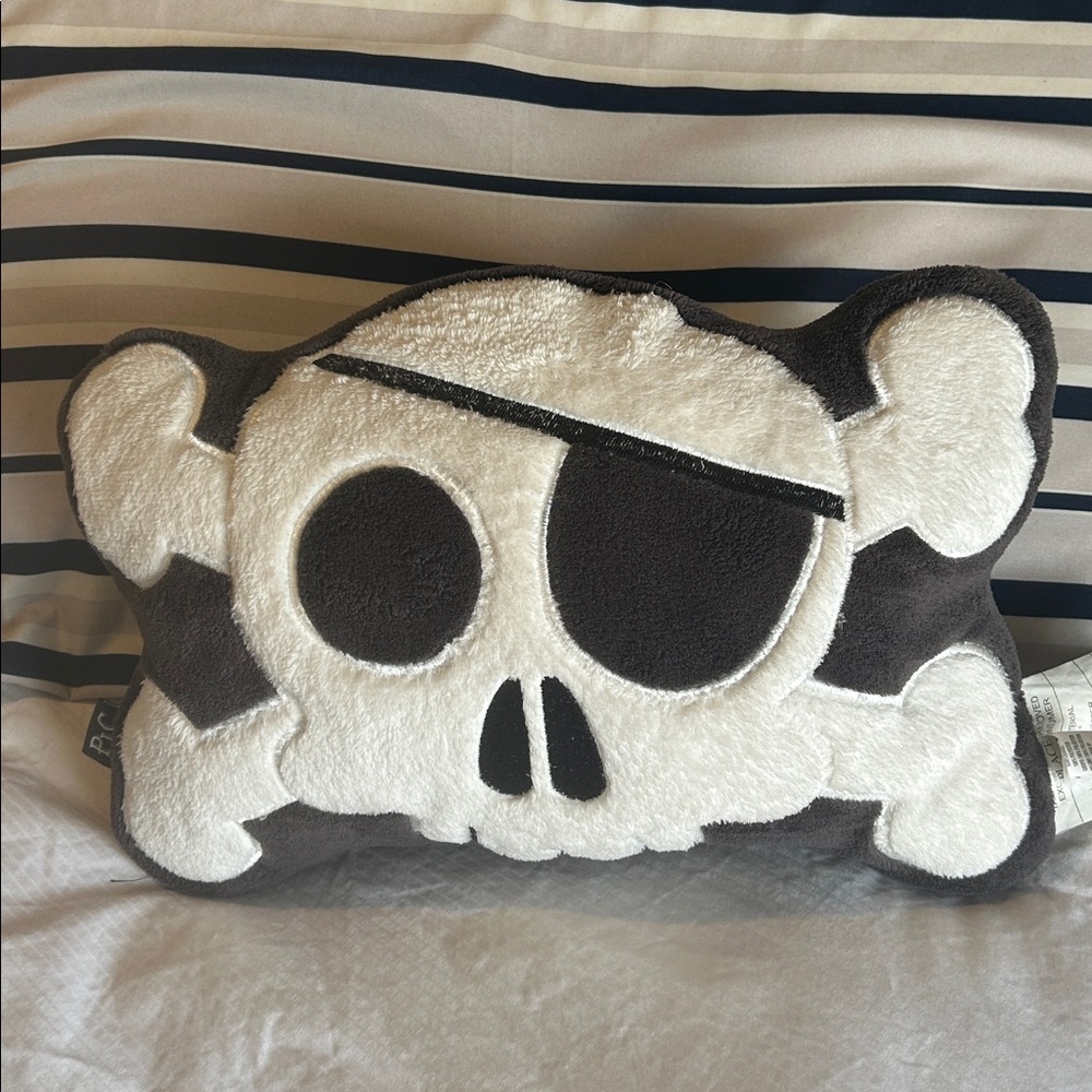 The children’s place skull pillow